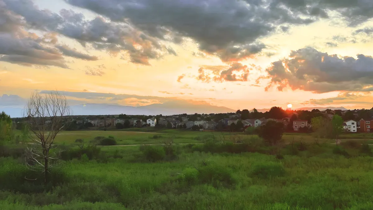 Pikes Peak at sunset seen from Doc Holiday Drive in the Indigo Ranch neighborhood of Colorado Springs on 9-5-2024.